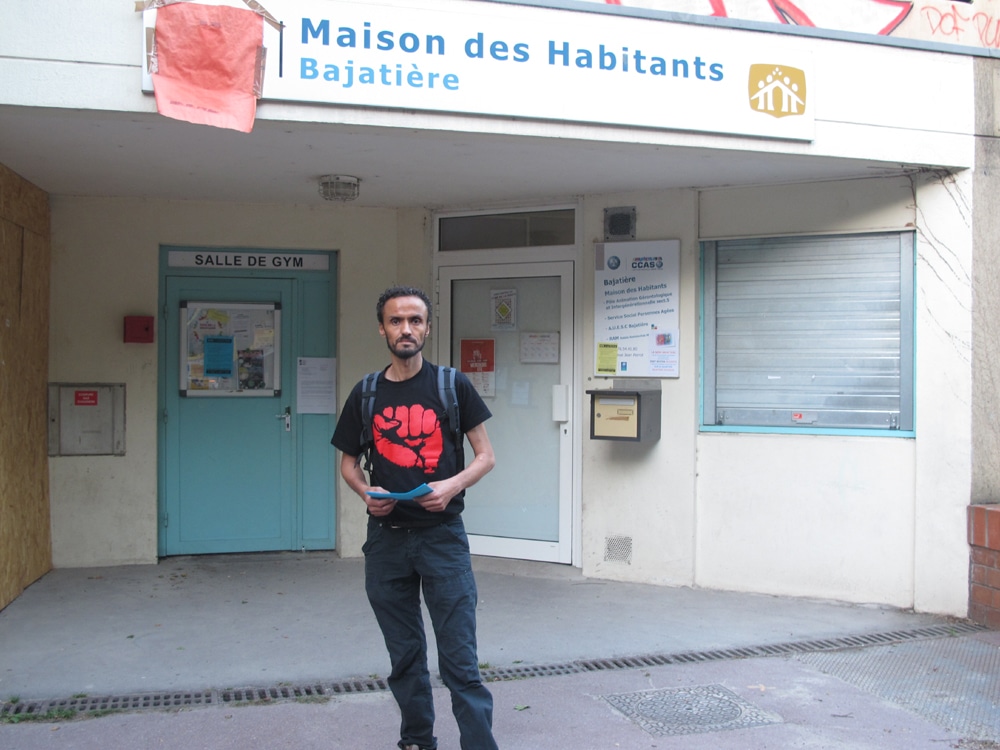 Abdel El Khouja l'un des organisateurs de la mobilisation contre la décision de la Ville de se retirer de la gestion de la Maison Des Habitants Bajatière © Séverine Cattiaux – Place Gre’net